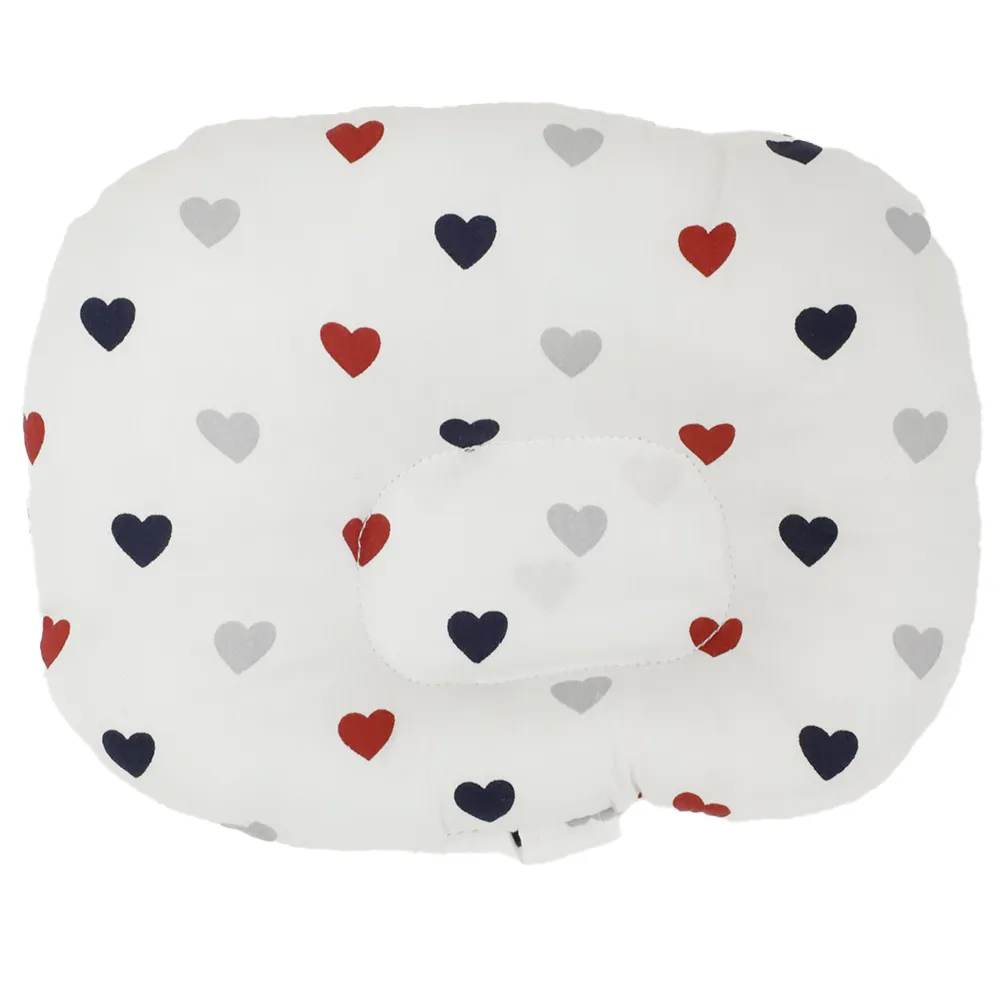 Almohada de amamantar estampada con corazones
